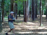 doug-russell-duck-hooks-around-the-4th-pine-tree-to-a-fairway-bunker